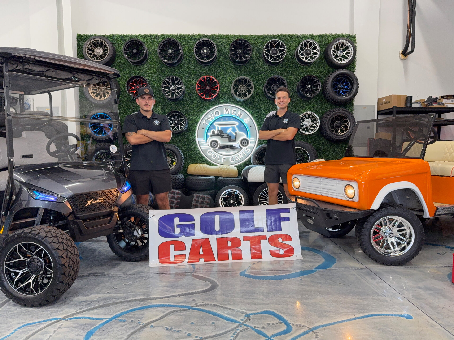 The Two Men & Golf Carts owners in their Cape Coral shop